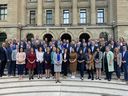 Danielle Smith poses with the Alberta UCP caucus at the McDougall Centre on Friday, Oct. 7, 2022.