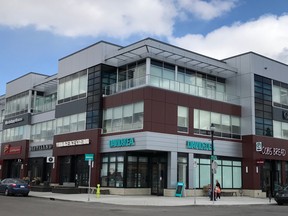 Garrison Corner is a three-story office and retail building on the Marda Loop.
