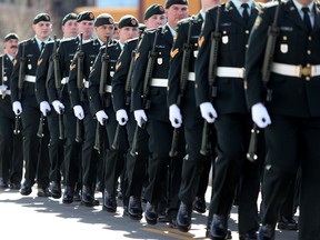 Author Michael Dorosh notes that it seems odd the debate over gun bans has ignored Canada's military history, especially  civilian training with military weapons. Members of the Calgary Garrison, comprised of Calgary-based Army Reserve soldiers from 41 Canadian Brigade Group (41 CBG), joined by a contingent of 100 soldiers from the British Army Training Unit Suffield, march during a parade in Calgary on April 8, 2017.