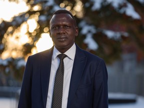 Garang Kuot, organizer of the South Sudanese conference, poses for a portrait outside his home in Calgary on Friday, November 11, 2022.