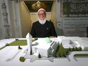 Imam Syed Soharwardy poses in Calgary on Tuesday, November 15, 2022 with a model of the future Green Dome Islamic School to be built in northeast Calgary.