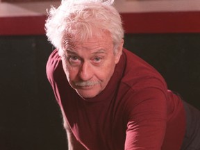 Canadian author WO Mitchell, playing billiards in 1988, died at the age of 83 in his Calgary home.