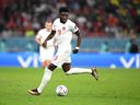 Alphonso Davies of Canada in action during the FIFA World Cup Qatar 2022 Group F match between Belgium and Canada at Ahmad Bin Ali Stadium on November 23, 2022 in Doha, Qatar.