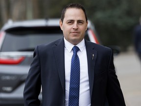 Advanced Education Minister Demetrios Nicolaides arrives for the swearing in of Alberta Premier Danielle Smith's new cabinet at Government House in Edmonton, Monday, October 24, 2022.