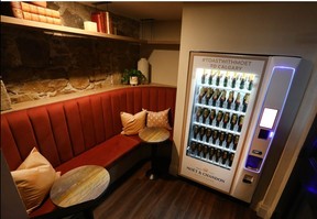 A unique custom Moet and Chandon champagne machine leads to the intimate champagne tasting area on the lower level at FinePrint located on Stephen Avenue. Jim Wells/Postmedia