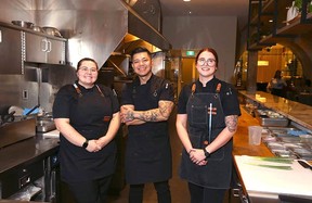Annamaria Novello (Junior Sous Chef), Francis Martinez (Executive Chef) and Holly Johnson (Sous Chef) in the FinePrint kitchen area on Stephen Avenue.Jim Wells/Postmedia