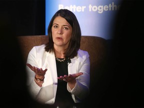 Alberta Premier Danielle Smith gestures as she addresses the business community during a lunch hour address at the Westin Hotel in Calgary on Friday, November 18, 2022.