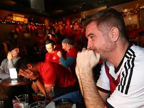 Canadian soccer fans watch match action as fans gather at the Ship & Anchor in Calgary to watch Canada's first World Cup match in Qatar against Belgium on Wednesday, November 23, 2022.