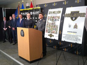 RCMP Cpl.  Nicolas LaForge speaks during a press conference announcing Project Collector which saw the dismantling of a national money laundering organization Wednesday, November 23, 2022.