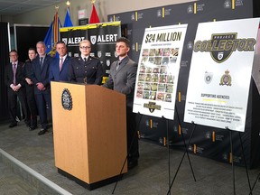 RCMP Cpl. Nicolas LaForge speaks during a press conference announcing Project Collector which saw the dismantling of a national money laundering organization Wednesday, November 23, 2022.