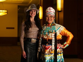 The 2023 Calgary Stampede royalty Princess Sarah Lambros and First Nations Princess Alayiah Wolf Child pose for a photo after Wolf Child was crowned in a ceremony at Stampede Park on Sunday, November 27, 2022.