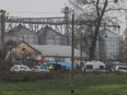 Police investigate the site where a missile strike killed two people in the eastern Poland village of Przewodow, near the border with war-ravaged Ukraine, Wednesday, Nov. 17, 2022.