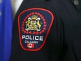 A Calgary Police officer displays the new shoulder badge in Calgary on Thursday, January 10, 2019. The service will start distributing the badges this month this month. A two-year rollout will see all officers wearing the new design by December 2020. Jim Wells/Postmedia