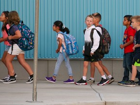 Students head back to class on the first day of school at Mahogany School in Calgary on Thursday, September 1, 2022.