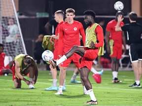 Alphonso Davies takes part in a training session in Doha on Tuesday.