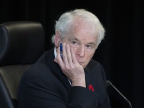 Commissioner Paul Rouleau listens to counsel question a witness at the Public Order Emergency Commission, in Ottawa, Friday, Nov. 4, 2022. A public inquiry is turning its attention to the role of online misinformation this morning as it continues probing Ottawa's use of emergency legislation to quell last winter's "Freedom Convoy" protests.