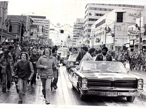 It was tough yardage for the players of the Edmonton Eskimos, as fans pushed for better view of their Grey Cup winning heroes during the homecoming parade in Edmonton on Nov, 25 1975. Edmonton Journal archives.