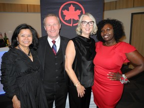 Pictured, from left, at the 14th annual Business in Calgary 2022 Leaders Awards are: Dr. Jackie Ottmann and her husband, Business in Calgary/Business in Edmonton publisher Pat Ottmann, Air Canada's Caroline Johnson and honouree Evelyne Nyairo, Ellie Bianca founder. Photo, Bill Brooks