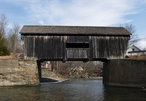 The Old Wooden Bridge in Warren, Vermont, was built in 1880 and is one of many historic wooden bridges in the area.