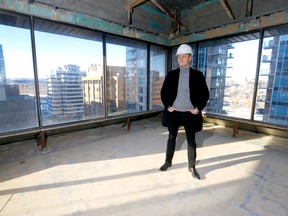 Maxim Olshevsky — the managing director of Peoplefirst Developments, which has has a $38-million downtown project that aims to turn the old SNC Lavalin building into a rejuvenated structure with more than 100 apartments in the west side of Calgary's core. Darren Makowichuk/Postmedia
