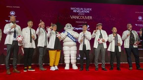 From left to right: Jean-Christophe Poirier in St. Lawrence, Michael Robbins in Anarena, Patrick Hennessy in dismemberment, Andrea Carlsson in Burdock & Co., Michelin Man, Allen Wren in Iden & Quanjude, Joel Watanabe in Cafe Tanto, Masayoshi Baba Mayayoshi Baba. and Gus Stieffenhofer-Brandson featured in Main at the Michelin Guide Awards at Vancouver Trade and Convention Center West on October 27, 2022. Arlen Redekop/PostMedia