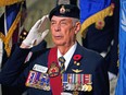 Royal Canadian Legion member Mack Torrie salutes during the Service of Remembrance held at the Alberta legislature on Thursday, Nov. 3, 2022.