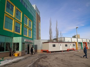A trailer for extra waiting space is being installed Monday outside the Alberta Children's Hospital.