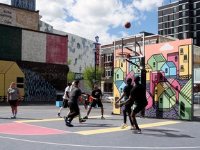 A game of hoops at The Bounce Outdoor Basketball Courts. Postmedia file photo.