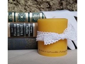 Holiday gifts available at the Library Store include feather flower bookmarks, Jane Austen quote candles and socks designed like the iconic library windows.