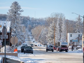 A deer crosses a street in the town of Turner Valley on Wednesday, January 5, 2022. The two neighbouring towns of Turner Valley and Black Diamond are merging to form a new town of Diamond Valley.
