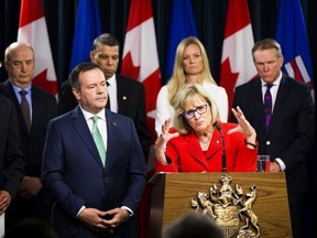 In September 2019, Premier Jason Kenney listens as Janice MacKinnon, a former Saskatchewan finance minister and chair of a blue-ribbon panel, announces the findings on the provincial government's expenditures. Now we need a blue-ribbon panel on Alberta's revenues, writes David Baugh.
