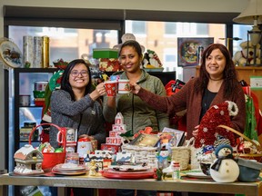 From left, Ada Angeles, Retail Ready Program employee support worker; Luwam Kelati, shop facilitator; and Shanice Saddleback, retail ready facilitator; they will be displayed at the Women in Need Society (WINS) store in the Beltline on Wednesday, November 23, 2022.