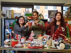 From left, Ada Angeles, Retail Ready Program employee support worker;  Luwam Kelati, shop facilitator;  and Shanice Saddleback, retail ready facilitator;  they will be displayed at the Women in Need Society (WINS) store in the Beltline on Wednesday, November 23, 2022.