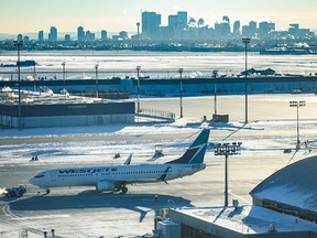 A WestJet plane gets ready for takeoff at Calgary International Airport (YYC) on Monday, December 19, 2022.