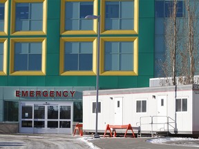 A heated trailer is stationed outside the Alberta Children's Hospital.