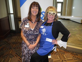 Pictured at the CHAS Holiday Luncheon held Dec 5 at the BMO Centre are CHAS president Jennifer Foss, left, and CHAS member Jennifer Brookman. The luncheon raised thousands of dollars for Youth Centres of Calgary. Bill Brooks photo