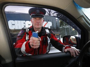 Calgary police Staff Sgt. Robby Patterson and other law enforcement officers are conducting multiple checkstops over the holiday season.