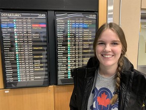 Kayla Burns spent most of Tuesday in line to rebook a flight home to Kelowna from Calgary International Airport after her flight was canceled due to snowfall in B.C.