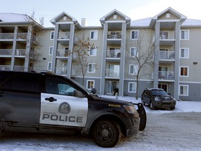 Police were on scene where two officers were attacked by a dog of a stolen vehicle culprit at a condo complex located at 1620 70 St. S.E. in Calgary on Saturday, December 31, 2022.