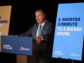 Premier Jason Kenney announces a new campaign to attract workers to Alberta at a news conference in Calgary on Monday, Aug. 15, 2022. The now former premier deserves some credit for a leap in migration to the province in 2022, writes columnist Rob Breakenridge.