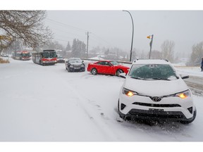 Buses and cars got stuck and slid on an icy 29th Street NW as Calgary was hit by the first major snowstorm of the winter on Wednesday, November 2, 2022.