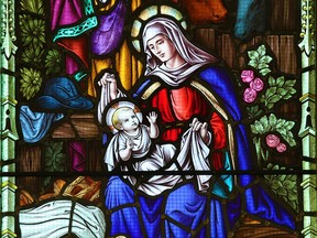 A stained glass nativity scene in Calgary's Cathedral Church of the Redeemer; Christmas is a time to celebrate Jesus' birth, but it also provides an opportunity for all people to refocus or recenter ourselves in how life is lived. Jesus is born, but something in each of us is also born anew at this time of year. Gavin Young/Postmedia.
