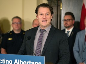 Jeremy Nixon, Minister of Seniors, Community and Social Services, speaks during a press conference announcing a new task force to help tackle homelessness and public safety in Calgary.  Friday, December 16, 2022.