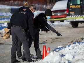 Calgary police investigate after two bodies were located in a vehicle in the community of Marlborough on Tuesday December 29, 2020.