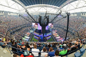 Fans gather at Arthur Ashe Stadium during the Fortnite World Cup Finals esports event in Flushing, New York, on July 27, 2019.