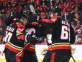 Dec 3, 2022; Calgary, Alberta, CAN; Calgary Flames forward Blake Coleman (20) celebrates his goal against the Washington Capitals with teammates in the first period at Scotiabank Saddledome. Mandatory Credit: Candice Ward-USA TODAY Sports