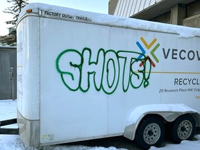 Provided photos show graffiti damage recently done at Vecova Center for Disability Services and Research in Northwest Calgary.  The facility was vandalized on December 15, 2022, and damage includes parts of its main building and its on-site property, such as Recycling Services' vehicles and donation bins.
