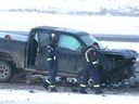 Calgary police investigate the scene of a fatal crash on Deerfoot Trail near 32nd Avenue NE in Calgary on Friday, December 2, 2022.