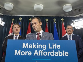 Matt Jones, Minister of Affordability and Utilities along with Travis Toews, President of Treasury Board and Minister of Finance and Jeremy Nixon, Minister of Seniors, Community and Social Services share details on legislation aimed at supporting Albertans during the affordability crisis on Wednesday, Dec. 7, 2022 in Edmonton.