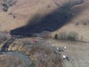 Emergency crews work to clean up the largest US crude oil spill in nearly a decade, following the leak at the Keystone pipeline operated by TC Energy in rural Washington County, Kansas, US, on December 9.